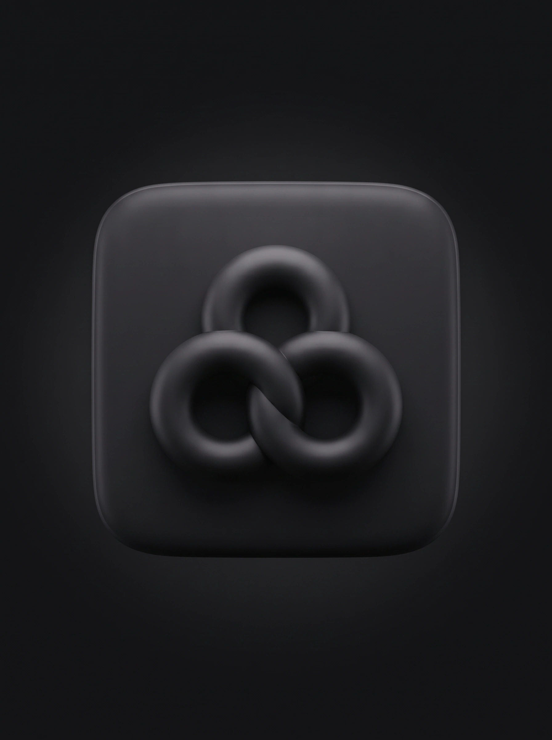 A black tile with three interlocking soft rings.